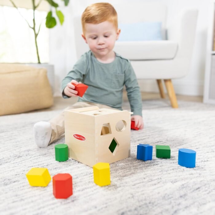 Melissa & Doug Shape Sorting Cube - Classic Wooden Toy With 12 Shapes - Image 7