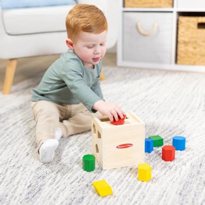 Melissa & Doug Shape Sorting Cube - Classic Wooden Toy With 12 Shapes - Image 2