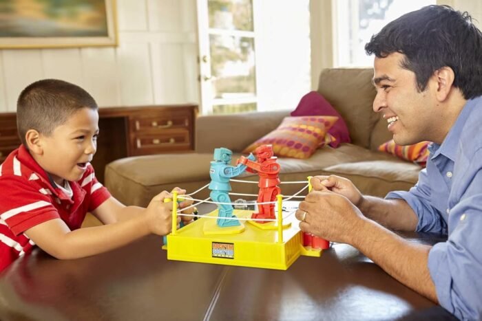Mattel Games Rock 'Em Sock 'Em Robots Kids Game, Fighting Robots with Red Rocker & Blue Bomber, Knock His Block Off - Image 4