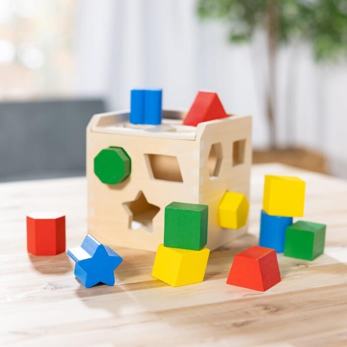 Melissa & Doug Shape Sorting Cube - Classic Wooden Toy With 12 Shapes - Image 9