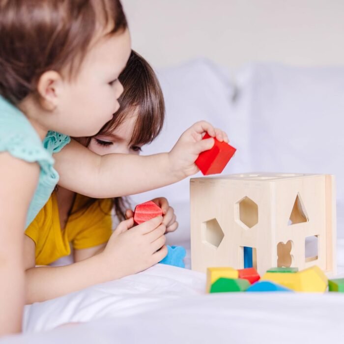 Melissa & Doug Shape Sorting Cube - Classic Wooden Toy With 12 Shapes - Image 8